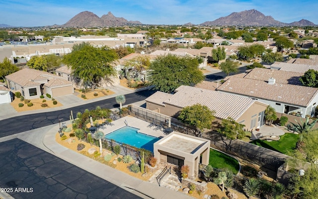8848 E Conquistadores Dr, Scottsdale, AZ 85255 - aerial view of residential area featuring a mountain backdrop and a pool