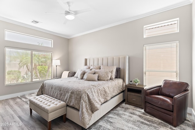 8848 E Conquistadores Dr, Scottsdale, AZ 85255 - bedroom with crown molding, light wood-style flooring, and a ceiling fan