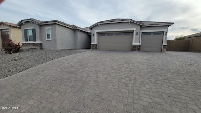 view of front of home featuring a garage