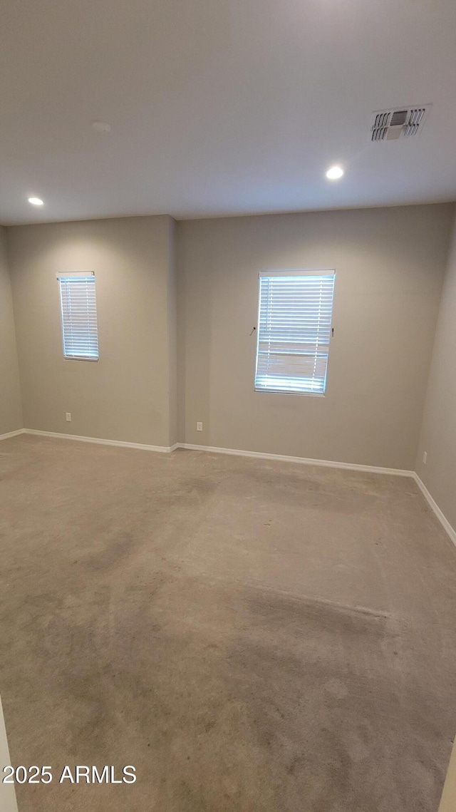 spare room with carpet flooring