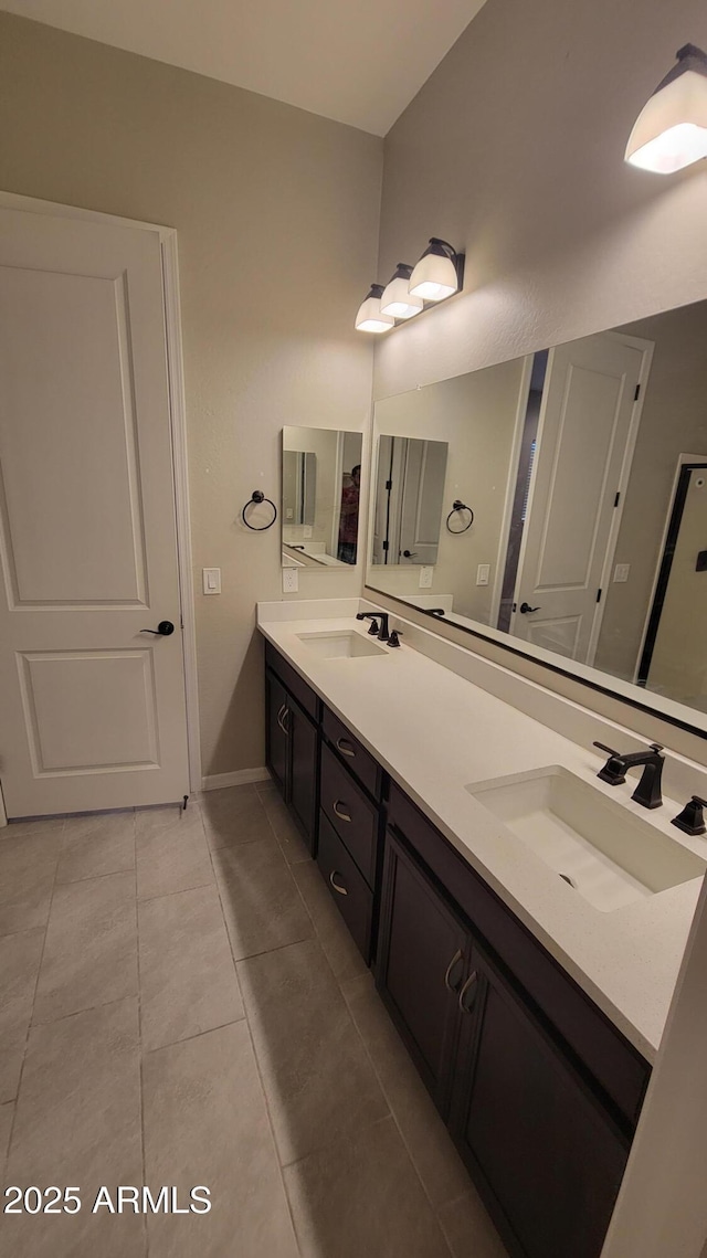 bathroom featuring vanity and tile patterned floors