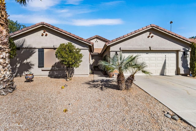 single story home with a garage