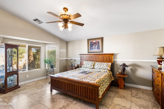 bedroom with lofted ceiling and ceiling fan