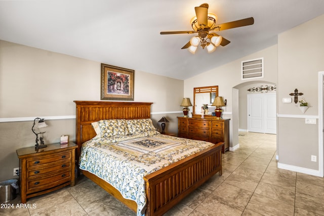 bedroom featuring lofted ceiling and ceiling fan