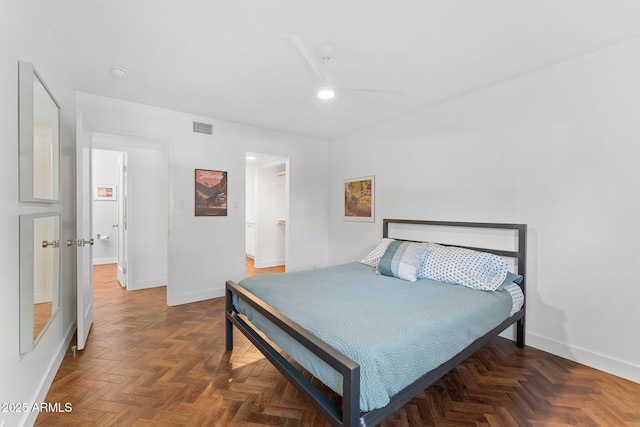 bedroom featuring dark parquet flooring and ceiling fan