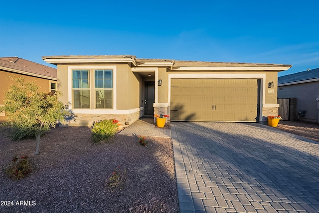 prairie-style home with a garage