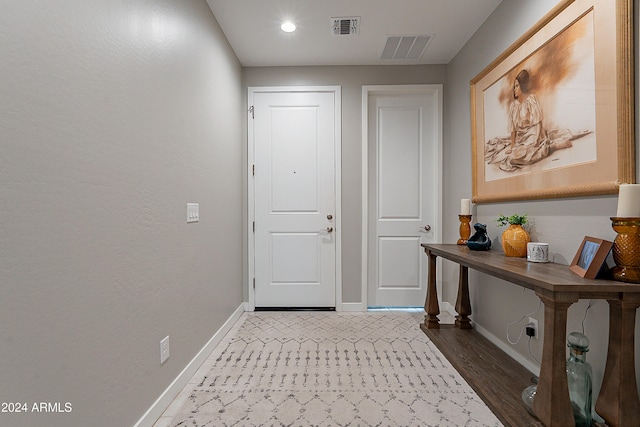 doorway featuring hardwood / wood-style floors