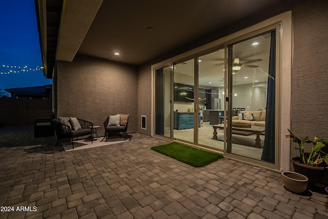 view of patio at twilight