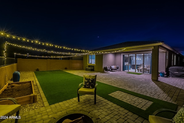 view of patio at twilight