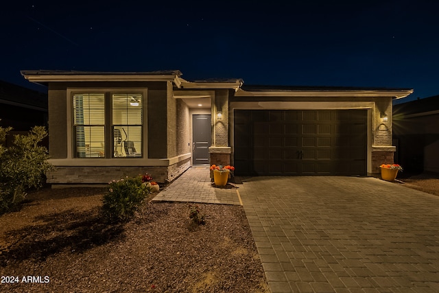 view of front of home with a garage