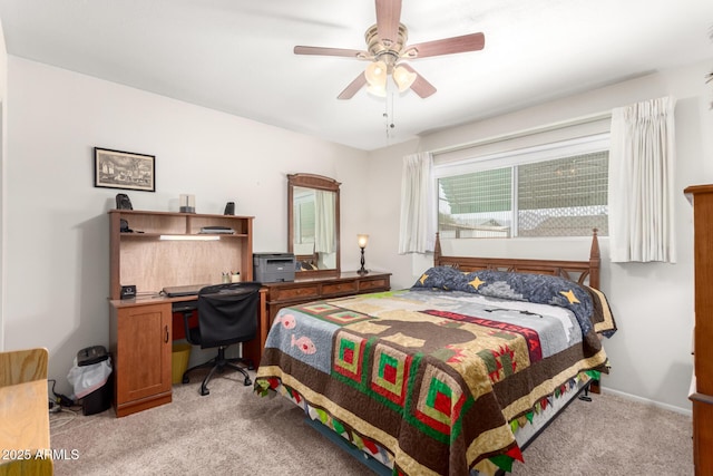 bedroom featuring ceiling fan and light colored carpet