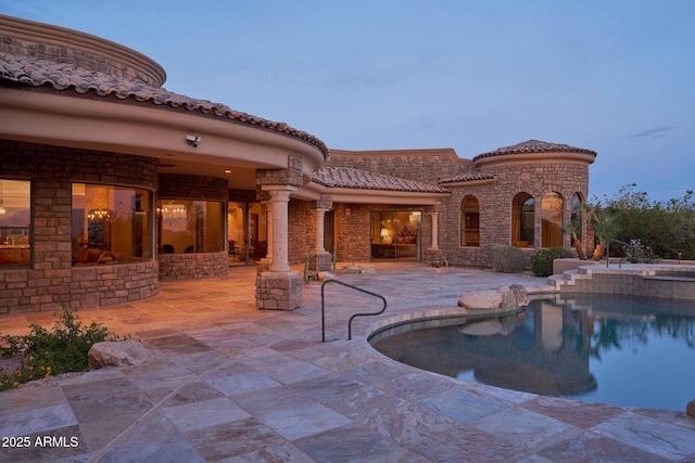 pool featuring a patio