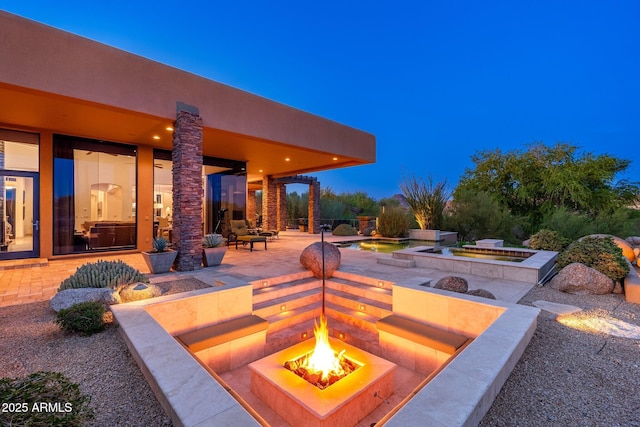 10267 E Cinder Cone Trl, Scottsdale, AZ 85262 - view of patio featuring a fire pit