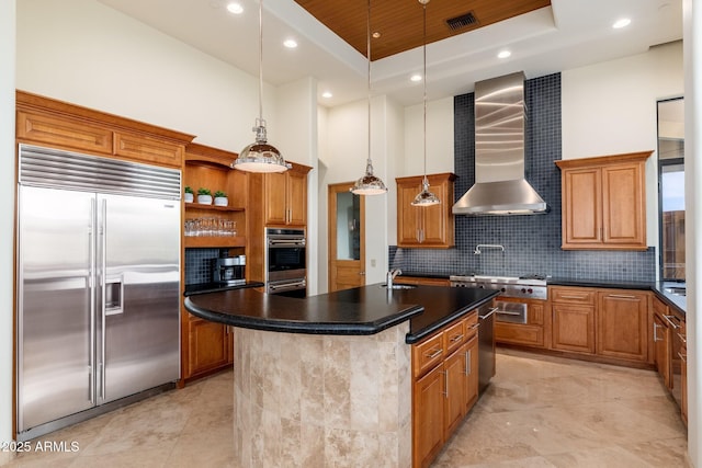 10267 E Cinder Cone Trl, Scottsdale, AZ 85262 - kitchen featuring appliances with stainless steel finishes, wall chimney exhaust hood, a sink, a towering ceiling, and backsplash