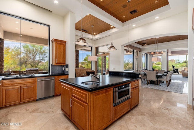 10267 E Cinder Cone Trl, Scottsdale, AZ 85262 - kitchen featuring stainless steel dishwasher, a raised ceiling, wood ceiling, healthy amount of natural light, and a high ceiling