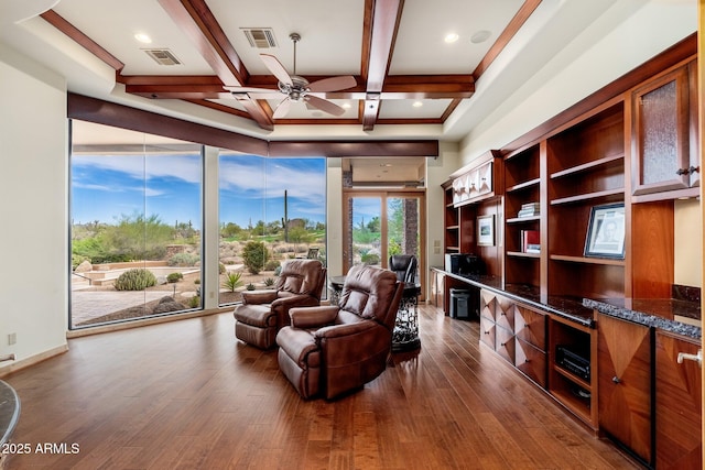 10267 E Cinder Cone Trl, Scottsdale, AZ 85262 - sitting room featuring a ceiling fan, beamed ceiling, dark wood finished floors, and coffered ceiling