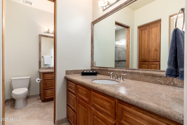10267 E Cinder Cone Trl, Scottsdale, AZ 85262 - bathroom with vanity, toilet, and tile patterned floors