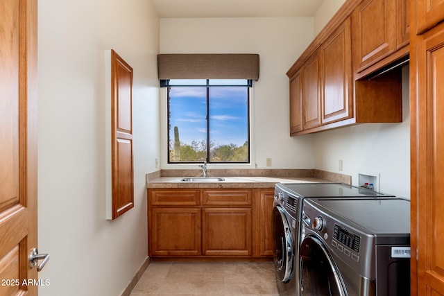 10267 E Cinder Cone Trl, Scottsdale, AZ 85262 - laundry room featuring washing machine and clothes dryer, cabinet space, and baseboards