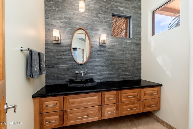 10267 E Cinder Cone Trl, Scottsdale, AZ 85262 - bathroom with vanity, tile patterned flooring, and decorative backsplash
