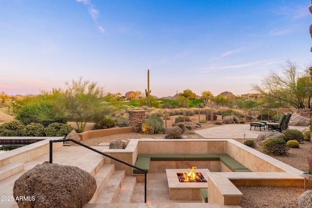 10267 E Cinder Cone Trl, Scottsdale, AZ 85262 - view of patio with an outdoor fire pit
