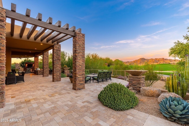 10267 E Cinder Cone Trl, Scottsdale, AZ 85262 - view of patio with outdoor dining space, a pergola, an outdoor hangout area, a ceiling fan, and a mountain view