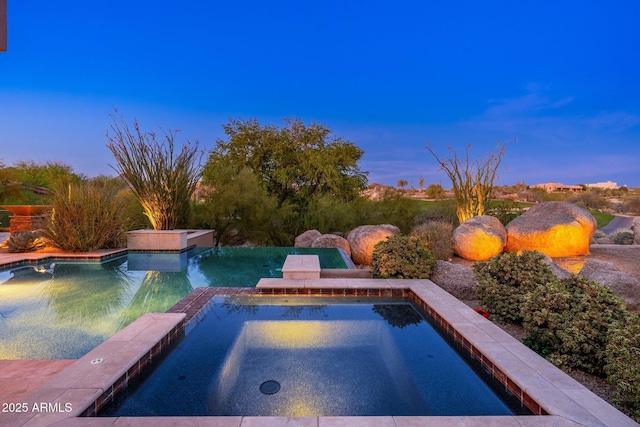 10267 E Cinder Cone Trl, Scottsdale, AZ 85262 - view of swimming pool with a pool with connected hot tub