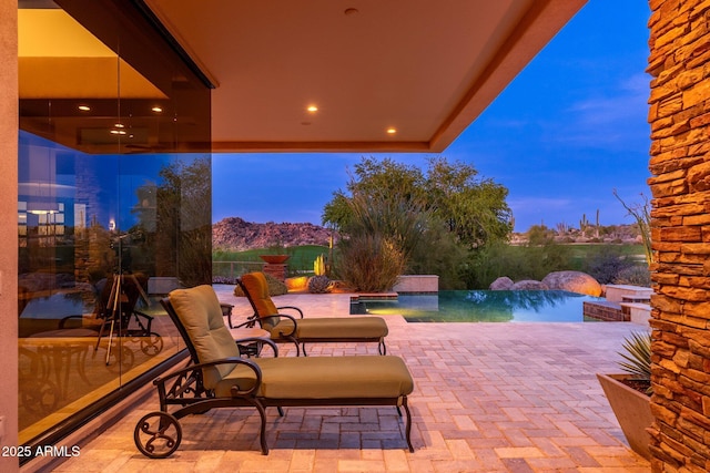 10267 E Cinder Cone Trl, Scottsdale, AZ 85262 - view of patio / terrace featuring an outdoor pool and a hot tub