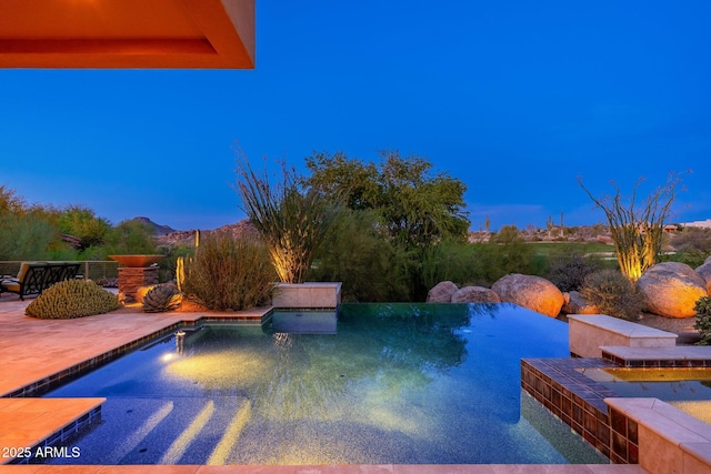 10267 E Cinder Cone Trl, Scottsdale, AZ 85262 - view of pool with an infinity pool and a mountain view