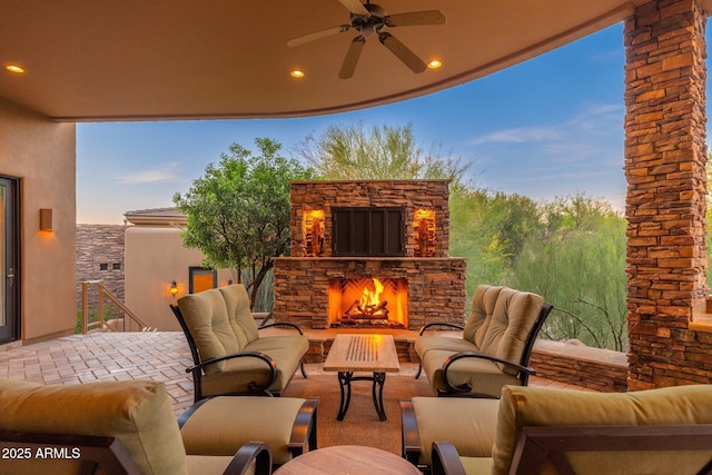 10267 E Cinder Cone Trl, Scottsdale, AZ 85262 - view of patio with an outdoor living space with a fireplace and a ceiling fan
