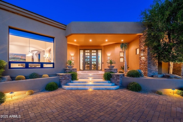 10267 E Cinder Cone Trl, Scottsdale, AZ 85262 - entrance to property featuring french doors, stucco siding, and stone siding