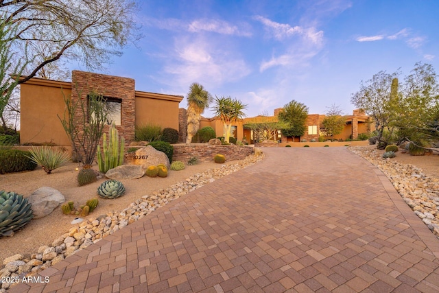 10267 E Cinder Cone Trl, Scottsdale, AZ 85262 - view of front of property with curved driveway and stucco siding