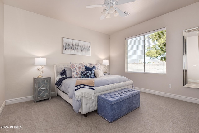 bedroom featuring ceiling fan and carpet flooring