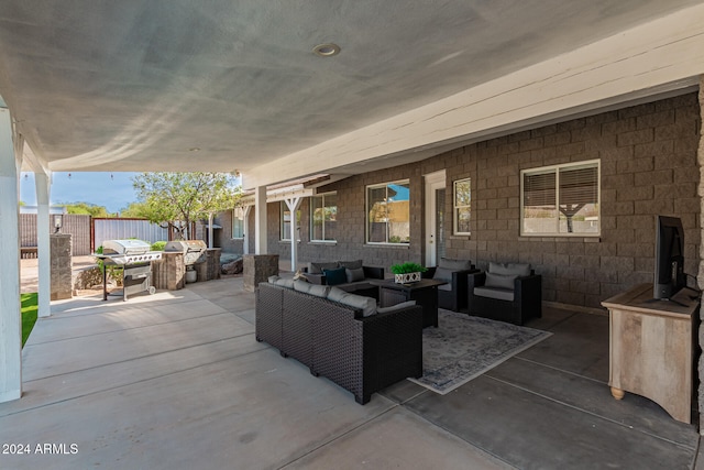 view of patio / terrace with area for grilling and an outdoor living space