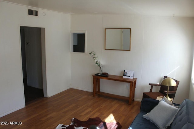 living room featuring dark hardwood / wood-style flooring