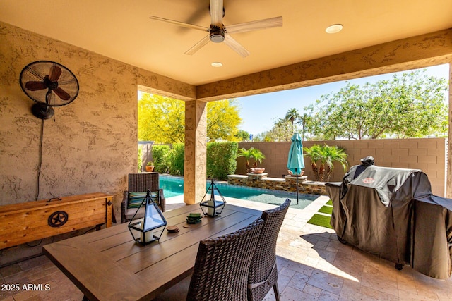 2229 N 139th Dr, Goodyear, AZ 85395 - view of patio / terrace featuring a fenced backyard, a ceiling fan, a fenced in pool, and outdoor dining area