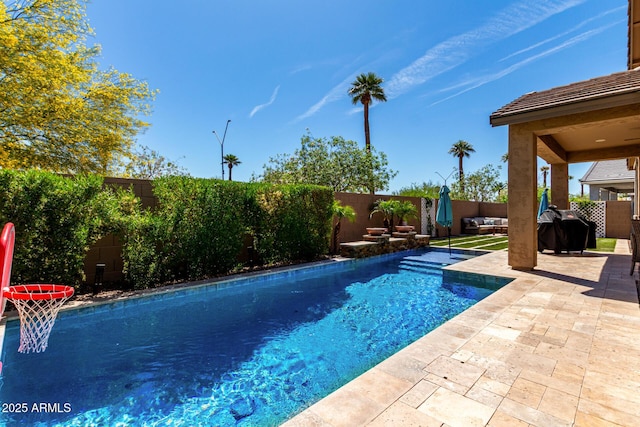 2229 N 139th Dr, Goodyear, AZ 85395 - view of swimming pool with a fenced in pool, a fenced backyard, and a patio area