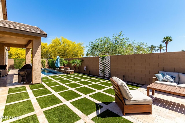 2229 N 139th Dr, Goodyear, AZ 85395 - view of patio featuring a fenced backyard, a fenced in pool, grilling area, and outdoor lounge area