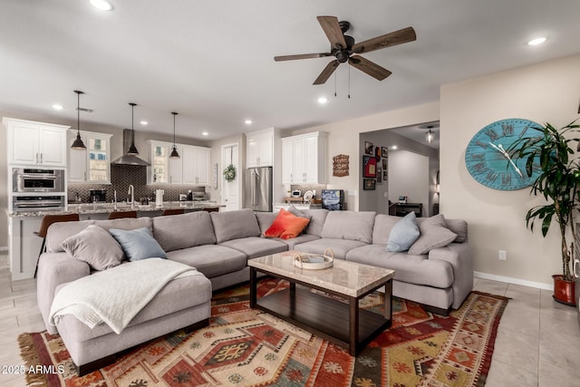 2229 N 139th Dr, Goodyear, AZ 85395 - living area featuring recessed lighting, a ceiling fan, baseboards, and light tile patterned flooring