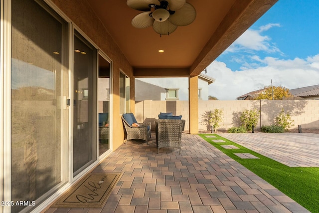 view of patio / terrace with ceiling fan