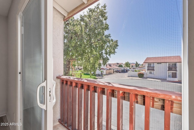 balcony featuring a residential view