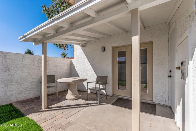 view of patio / terrace with fence