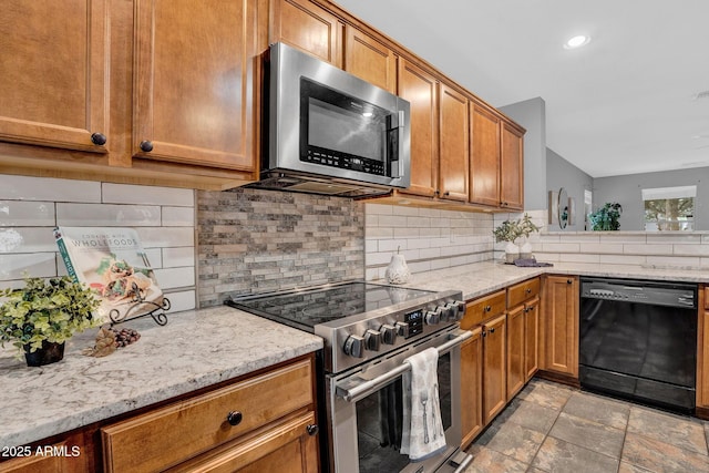 1314 S Bridgegate Dr, Gilbert, AZ 85296 - kitchen featuring appliances with stainless steel finishes, backsplash, brown cabinets, light stone countertops, and recessed lighting