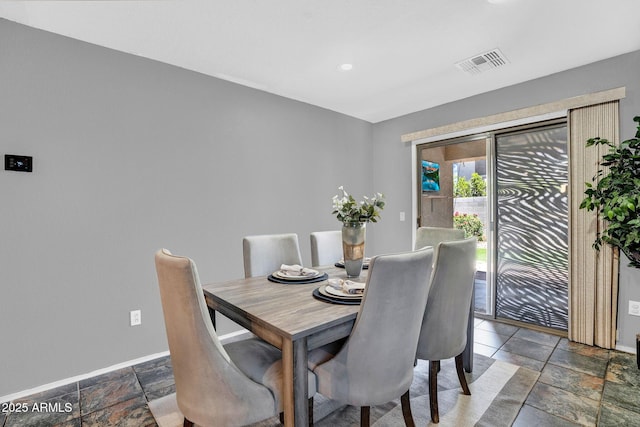 1314 S Bridgegate Dr, Gilbert, AZ 85296 - dining room with stone tile flooring and baseboards