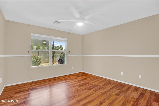 1314 S Bridgegate Dr, Gilbert, AZ 85296 - unfurnished room with wood finished floors, baseboards, and a ceiling fan