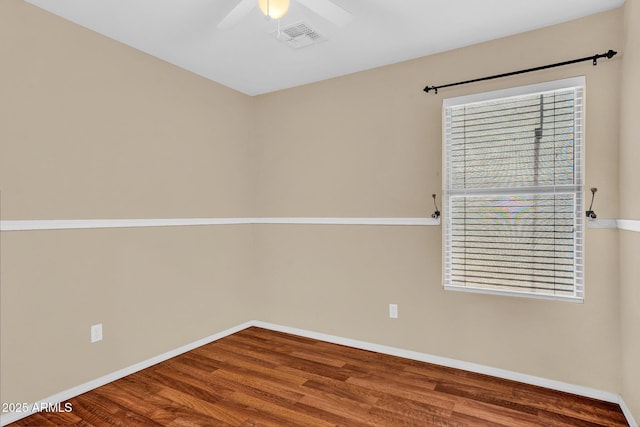 1314 S Bridgegate Dr, Gilbert, AZ 85296 - unfurnished room with baseboards, wood finished floors, and ceiling fan