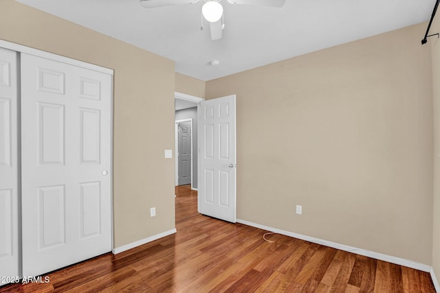 1314 S Bridgegate Dr, Gilbert, AZ 85296 - unfurnished bedroom featuring baseboards, light wood-style floors, and ceiling fan