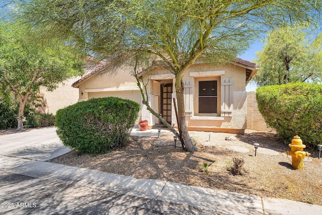 1314 S Bridgegate Dr, Gilbert, AZ 85296 - view of front of home featuring an attached garage and stucco siding
