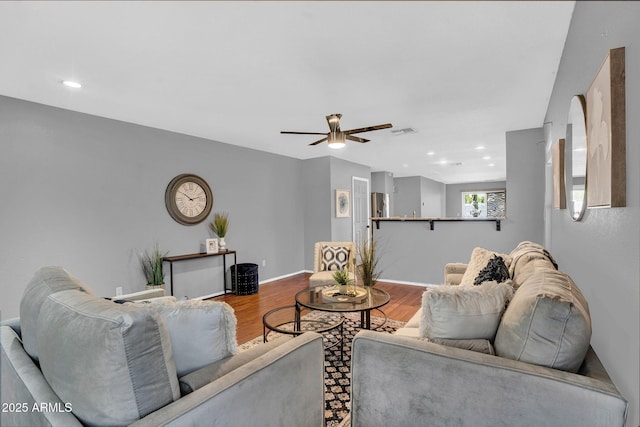 1314 S Bridgegate Dr, Gilbert, AZ 85296 - living area featuring wood finished floors, ceiling fan, baseboards, and recessed lighting