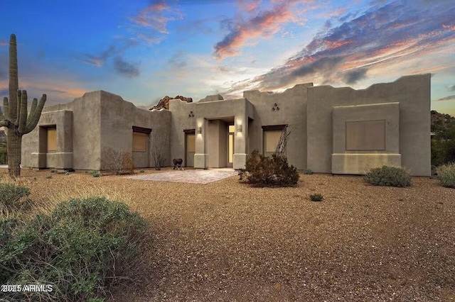 southwest-style home with stucco siding