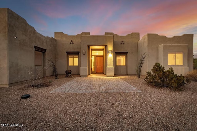 view of front of house with stucco siding